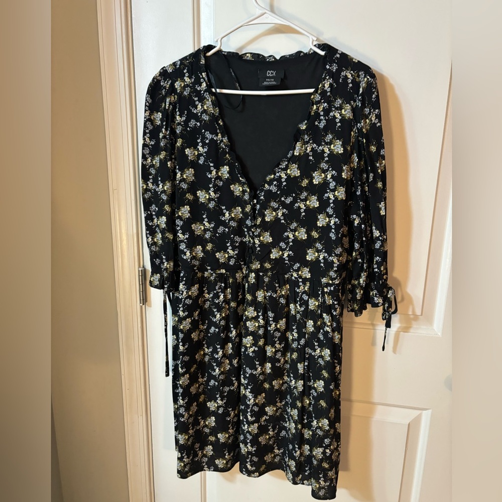 Black dress with light blue and white flowers